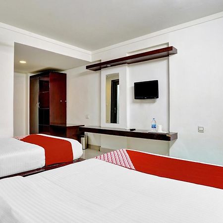Hotel OYO Flagship 82582 Aec Residency à Mararikulam Extérieur photo