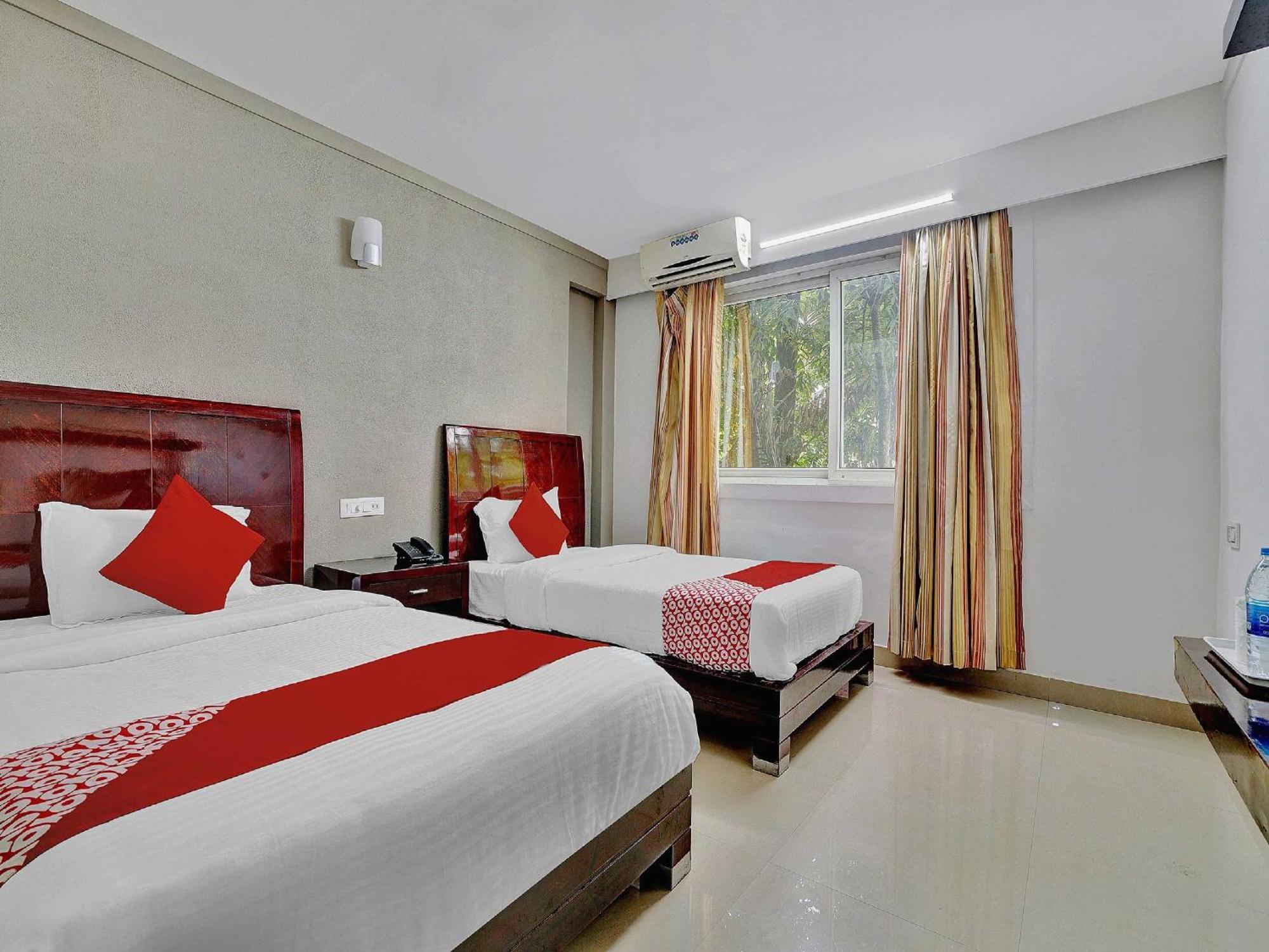 Hotel OYO Flagship 82582 Aec Residency à Mararikulam Extérieur photo