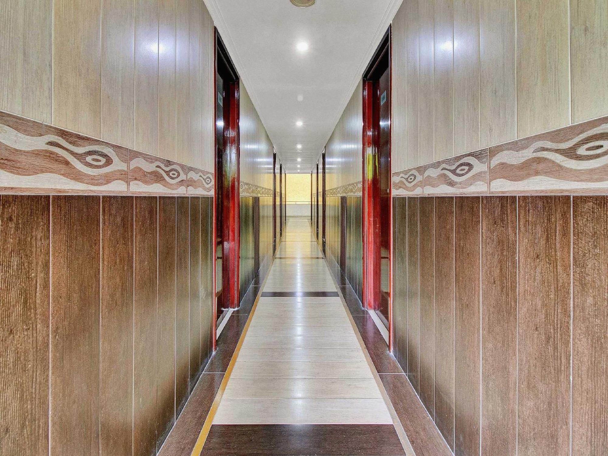 Hotel OYO Flagship 82582 Aec Residency à Mararikulam Extérieur photo