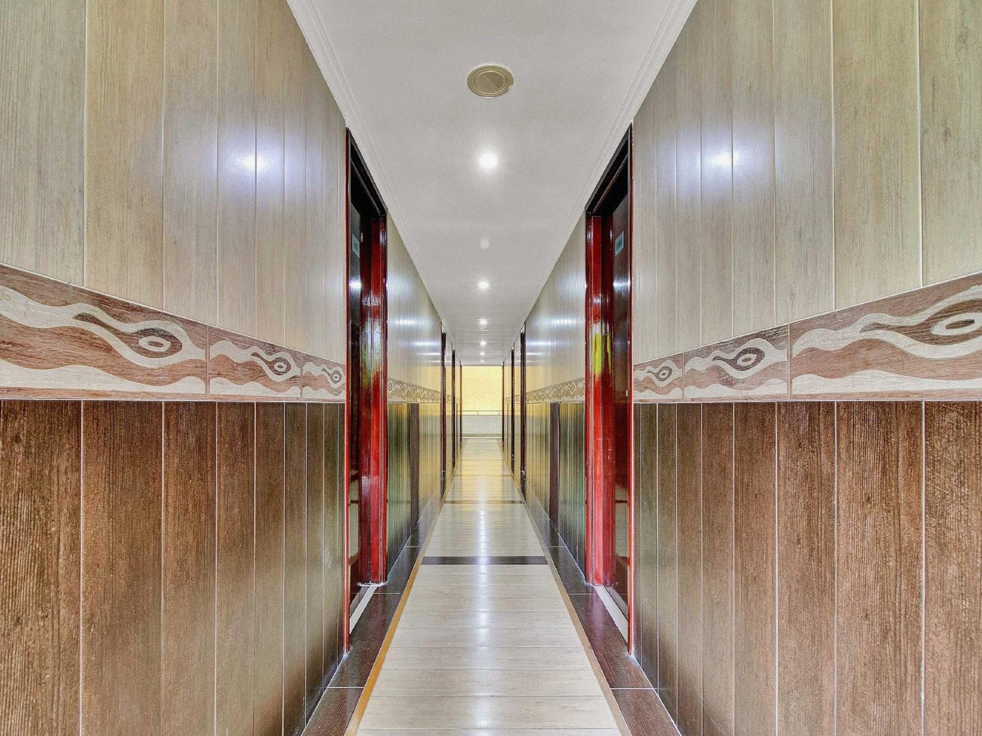 Hotel OYO Flagship 82582 Aec Residency à Mararikulam Extérieur photo