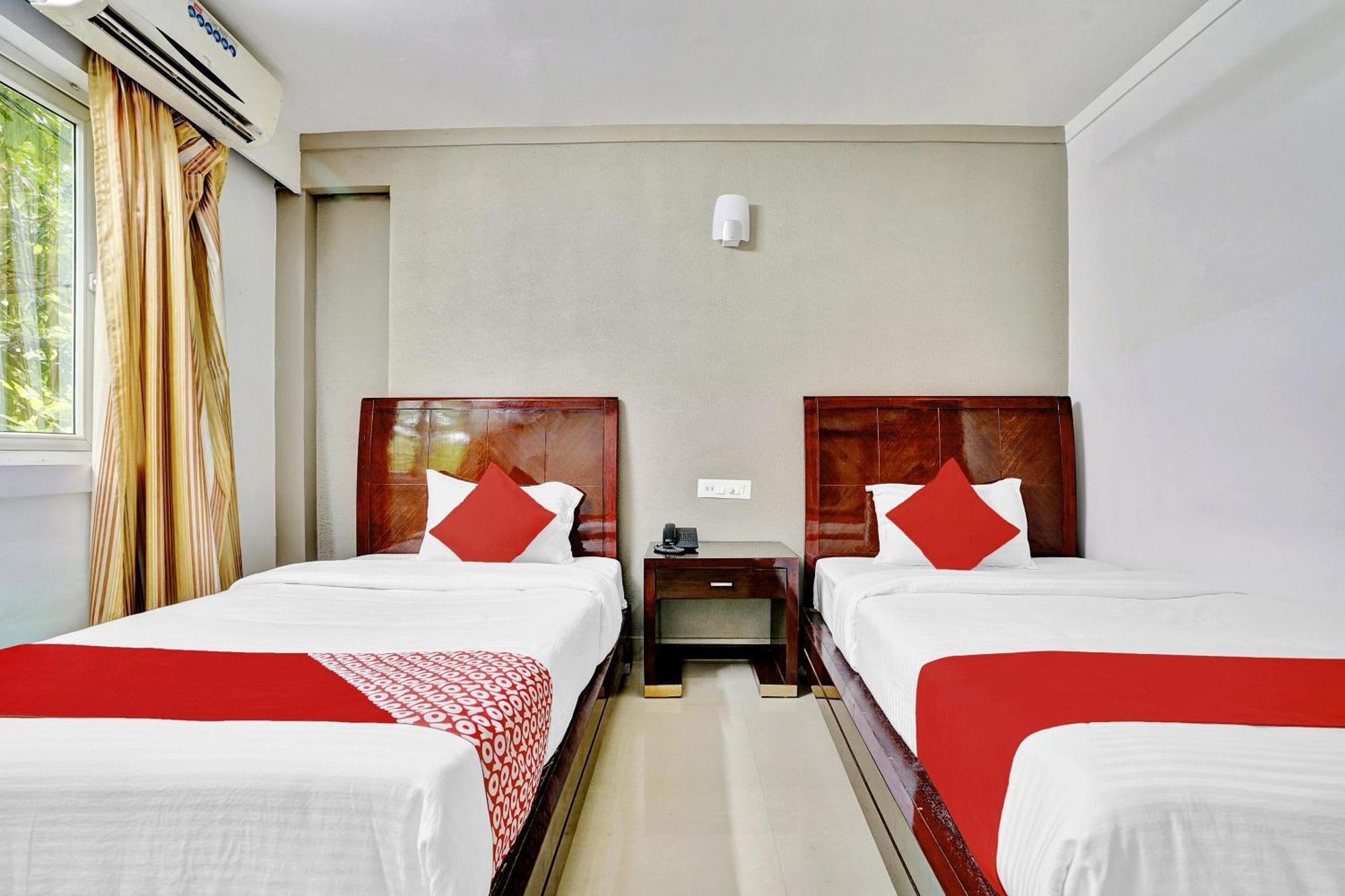 Hotel OYO Flagship 82582 Aec Residency à Mararikulam Extérieur photo